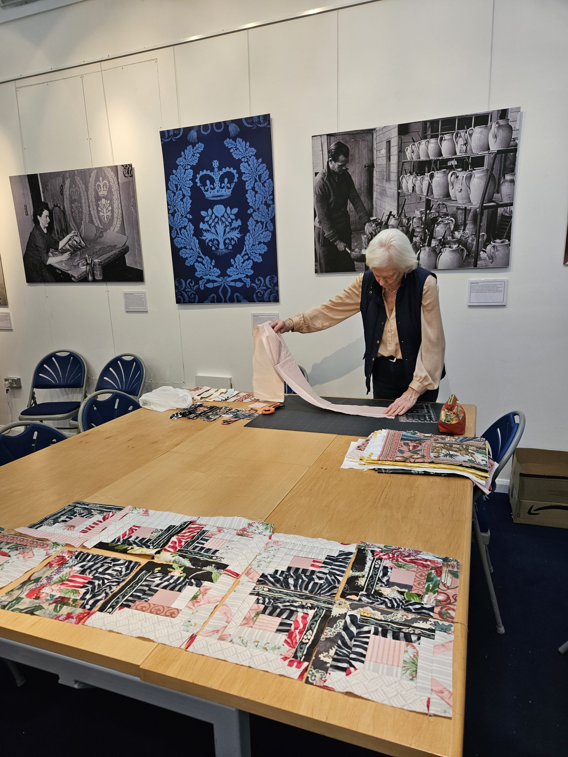 20250911_121359 Chris Helm assesses textiles to be used for the patchwork project