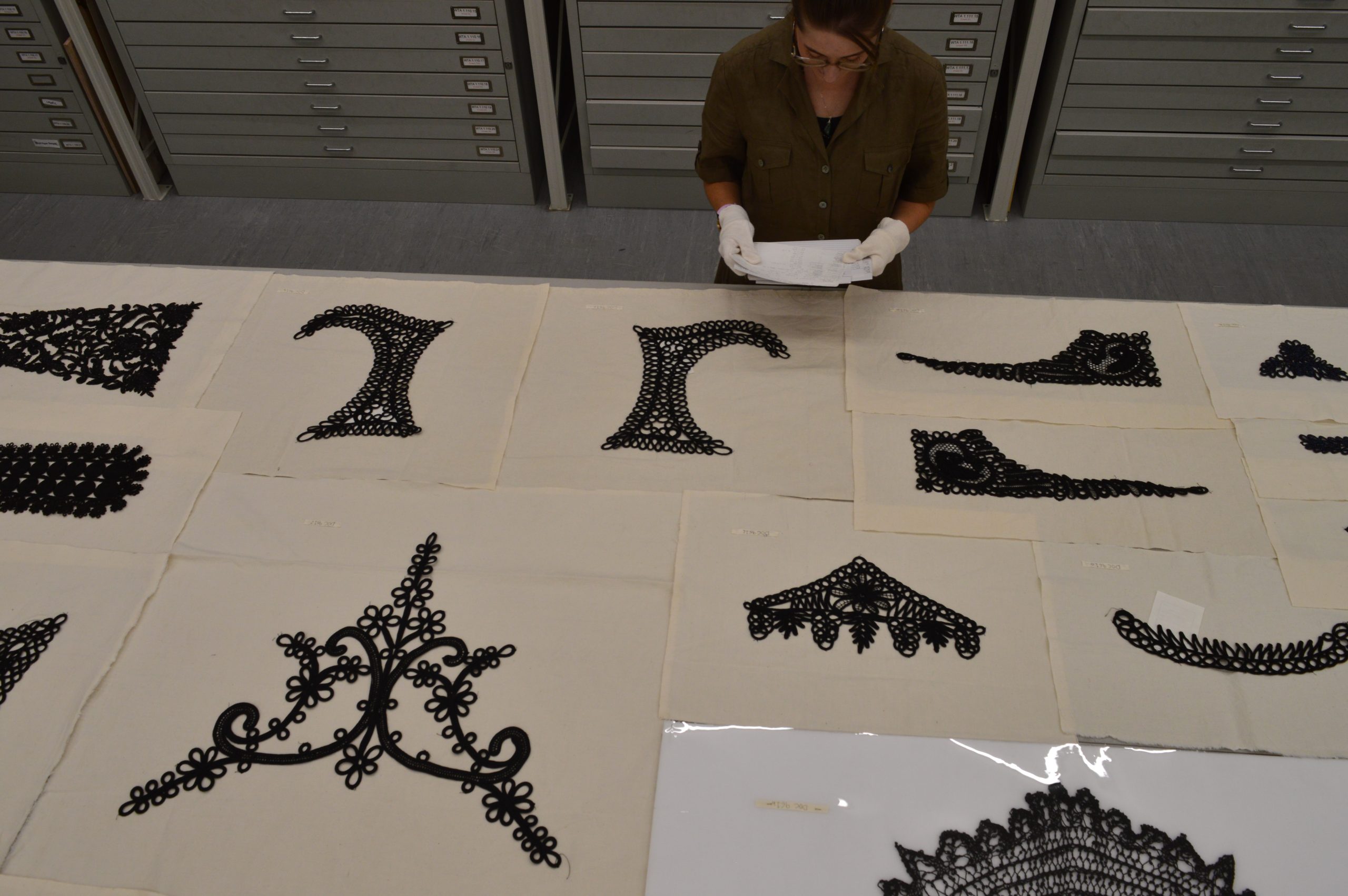 DSC_0239 Jess Flewitt assessing pieces from the passementerie collection at the Warner Textile Archive